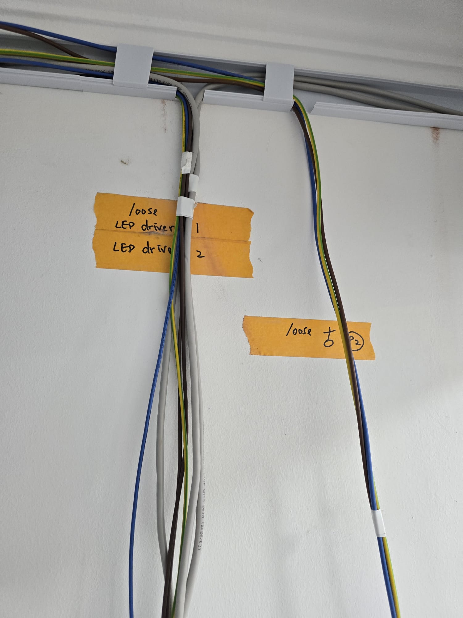 Close-up of labelled loose LED driver wiring ready for connection